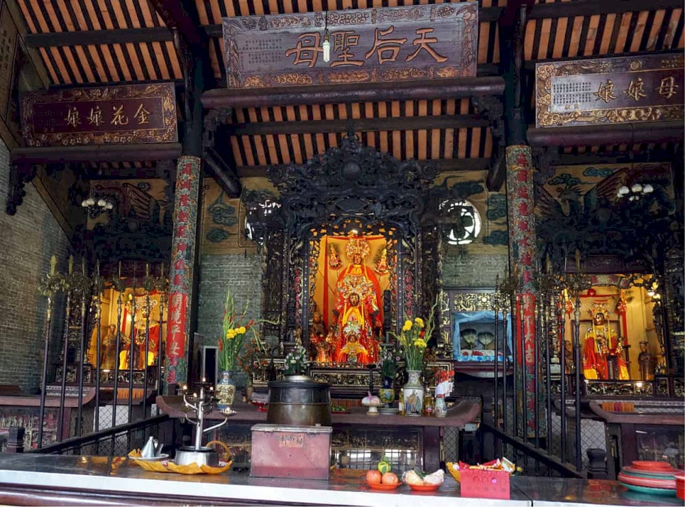 The 1-meter-tall wooden statue of Thien Hau, the sacred heart of the entire Temple